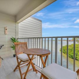 Sunset on the Bay Designer Condo with Private Balcony and Hotel Heated Pool