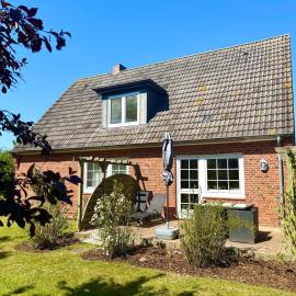 Jaardenhuug - EG, hotel en Utersum