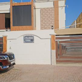 Anushthan Villa a private serviced villa for events and staycation with luxury views of garden and fountain pool in UAE, hotel u gradu Ajman