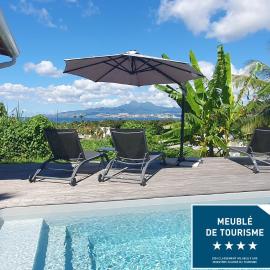 Villa KANOA - T2- classé 4 étoiles - Vue Mer - Piscine - SPA, hotel in Les Trois-Îlets