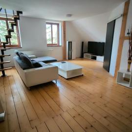 Spacious duplex apartment with fireplace by the Nisa River