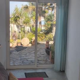 Stylish loft with views to cliffs, garden and beach of Famara
