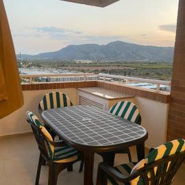 Apartamento con terraza, piscina y vistas en Oropesa del Mar Edificio Torremar, hotel in El Borseral