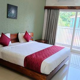 Nelleri Residency Managed By Vaishno Hospitality: Iritti şehrinde bir otel