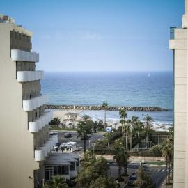 Skyline 1BR Apartment with City and Sea View