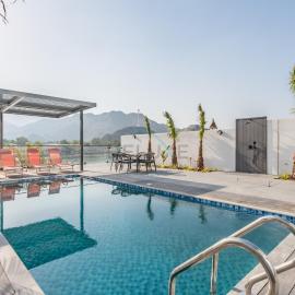 Facing the Sea and Mountains 4BR Villa with Assistant Room and Private Pool, Al Dana Island, Fujairah by Deluxe Holiday Homes