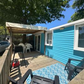 Location mobile-home confort face au lac, hotel in Aureilhan