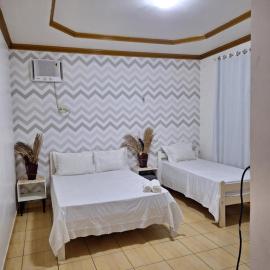 Quarto triplo com banheiro em Pousada e Restaurante
