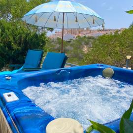 Villa by the sea with jacuzzi, garden & park view