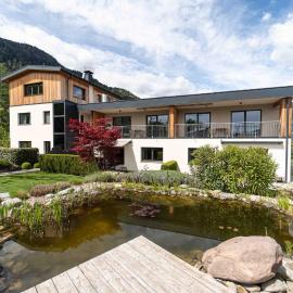Felsenegg appartements - moderne Wohnungen im Luftkurort mit traumhaftem Garten Nähe Meran für Paare und Familien, Hotel in Völlan