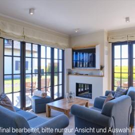 Reetland am Meer - LuxusPlus Reetdachvilla mit 4 Schlafzimmern und Kamin G10, hotell i Dranske