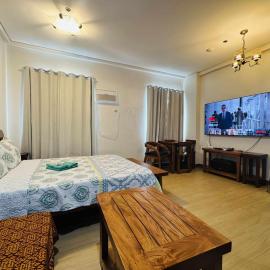 Happy Stays E - 300mbps - 65"TV NetFlix, Disney - Washer, hotel in Trece Martires