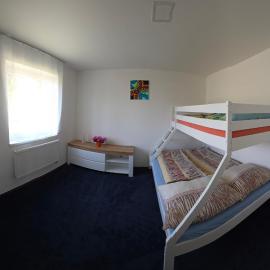 Apartmány u jízdárny