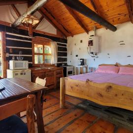 cabaña de sierras- tronco piedra