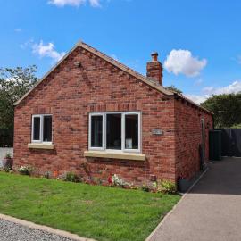 Dans Holiday Cottage, hotel a Barmston