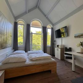 Kleine NordseePerle in Tossens mit Balkon - Ferienwohnung 648, hotel v destinácii Tossens