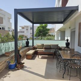 Appartement lumineux avec terrasse XXL, piscine & plage et vue montagne, Hotel in Imi Ouaddar