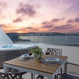 Ivory Suites Penthouse w hot tub by Homely!