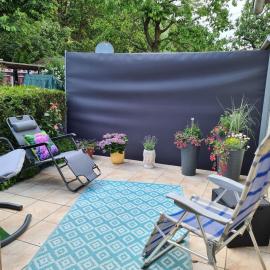 Ferienwohnung mit Wintergarten, Terrasse und Parkplatz