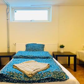 Cozy room with two single bed in Landskrona, hotel din Landskrona