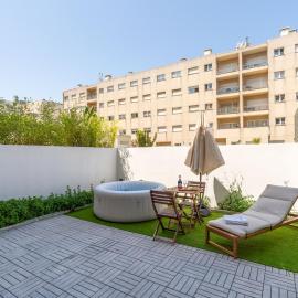 HostWise – Modern Flat w/ Terrace | Near the Beach
