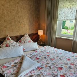 Zentrumsnahes Gästezimmer in Ferienwohnung โรงแรมในโกทา