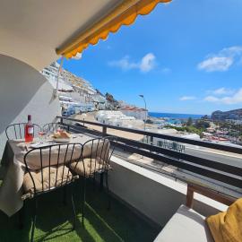 Modern Apartment with Sea View with Pool Puerto Rico, hotel in Mogán
