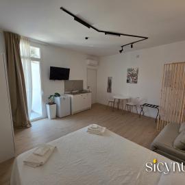 Sicynum, hotell sihtkohas Oliveri