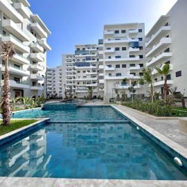 Duplex Luxe 3 Chambres Vue Mer & Piscine à Zenata Eco City, hotel in Aïn Harrouda