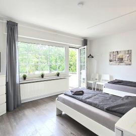 Modern 6-Bedroom Apartment with Rooftop Terrace, free Wi-Fi and Parking- MND01