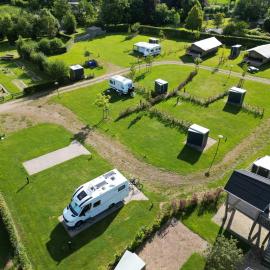 Empty camping spot for your tent, caravan and camper, hotel in Swalmen