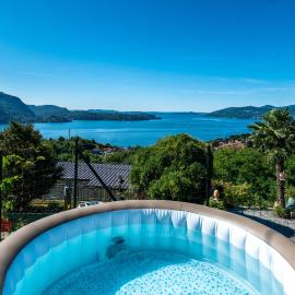 Casa 24 - Trilocale con Vista Lago, Giardino e Idromassaggio Gonfiabile