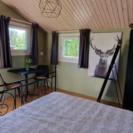 Cosy private cottage with stunning view, hótel í Sunne