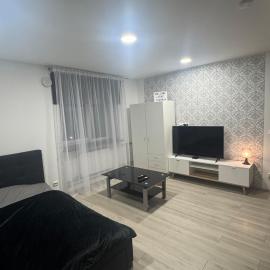 Downtown riverside apartment with parking