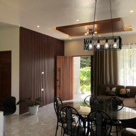 The CozyNest Camiguin Homestay, hotel i Mambajao