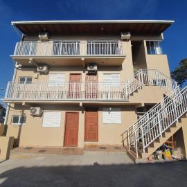 Casa e Kitnets Imbituba Praia da Vila, hotel en Imbituba
