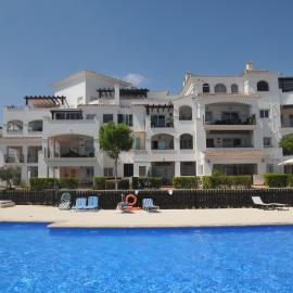 Hacienda Riquelme Golf Retreat with pool view and sunny terrace