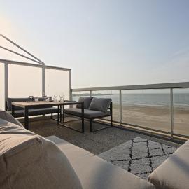 The happy view - penthouse met 2 terrassen op de zeedijk