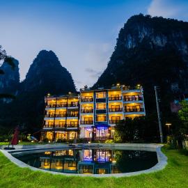 Yangshuo Mountain River Ballad Hotel - Free Yangshuo Train Station Pick Up and Drop Off, hotel in Yangshuo