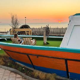 The Boat House - Beachfront Garden Home, hotel a Mareny Barraquetas