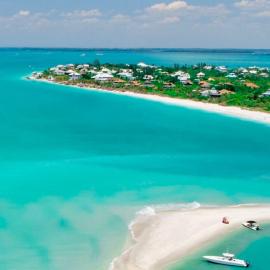 Luxury Beach Condo Located On The Bay In A Tropical Oasis!!!