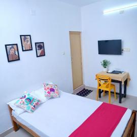 Roomify Inn, hotel in Trivandrum