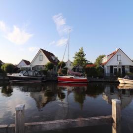 Nice holiday home on the water in Grou, hotel in Grou