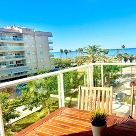 Apartamento 1ª línea playa con piscina y parking