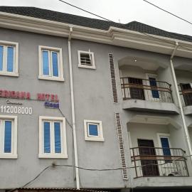Americana Hotel, hotell i Suru Lere