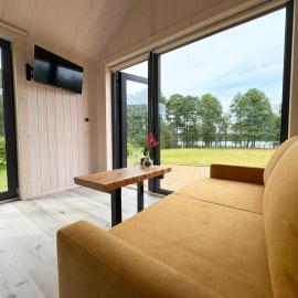 Rātes Krasti - Rasa - holiday house with sauna and lakeview, ξενοδοχείο σε Lejasciems
