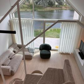 Chalet Eau Vive Mase - Luxe vakantiewoning in Maaseik aan de Maas، فندق في ماسايك