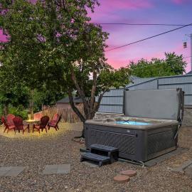 Light-filled home with outdoor hot tub and firepit