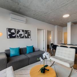 Chic 4-Bedroom with Skyline Views & Amenities