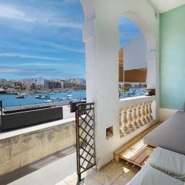 Traditional Maltese Townhouse with Backyard Garden and Seafront Location